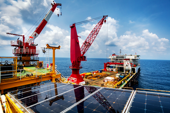 Ship docking at port with solar panels